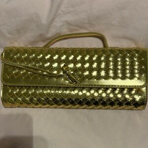 Luxurious Gold Woven Clutch by [Brand]